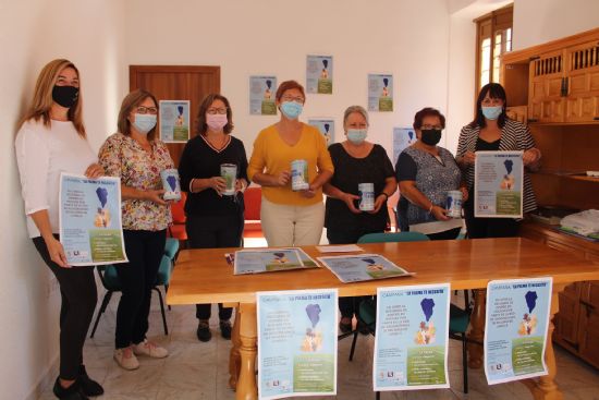 La Red de Asociaciones de Mujeres repartir 150 huchas para recoger fondos destinados a La Palma